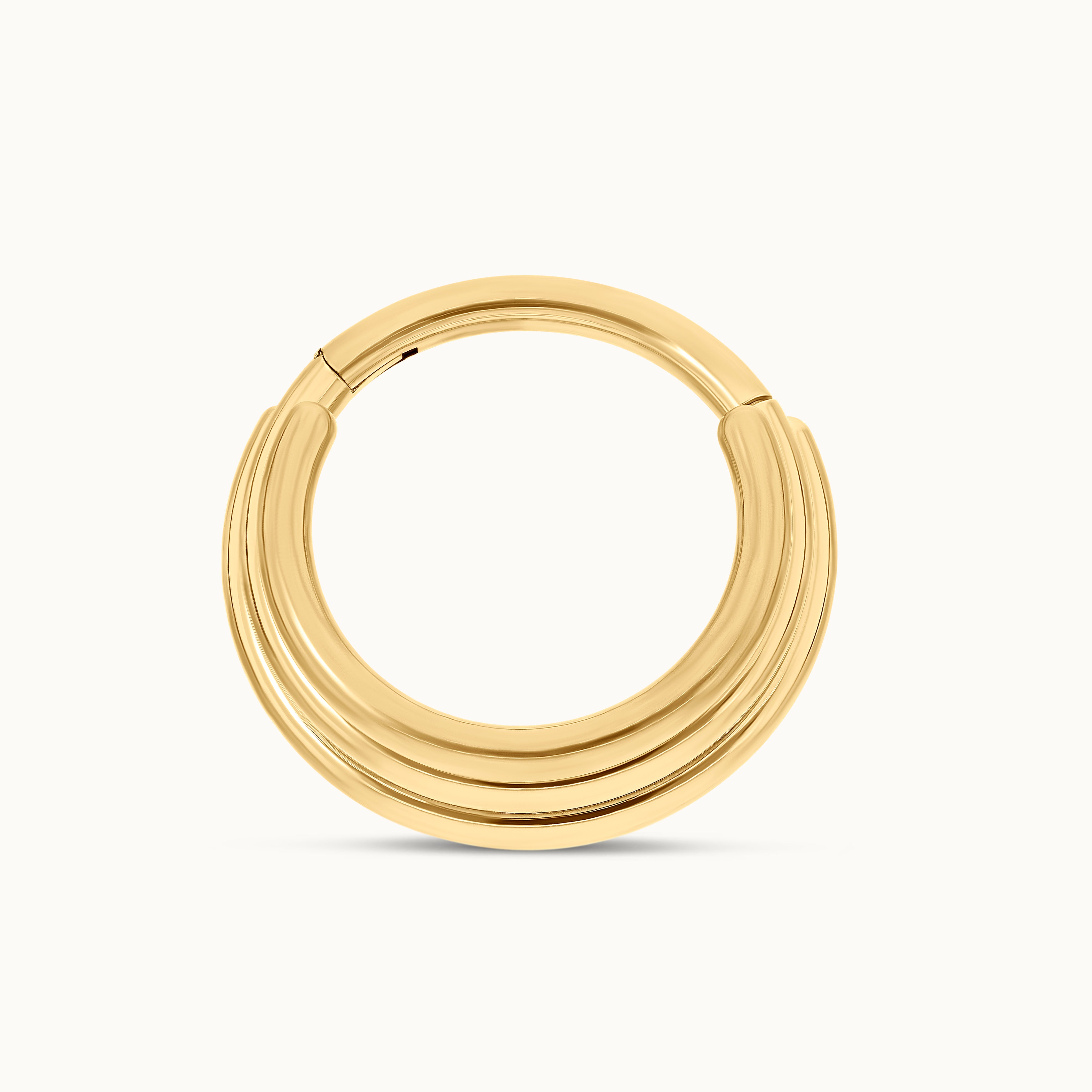obsidian-piercing-gudja-anneau-clicker-titane-pvd-gold-triple-anneau-fusionn-pou image 1