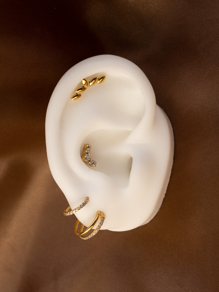 obsidian-piercing-situla-labret-titane-pvd-gold-courbe-de-cinq-feuilles-miroir-h image 3